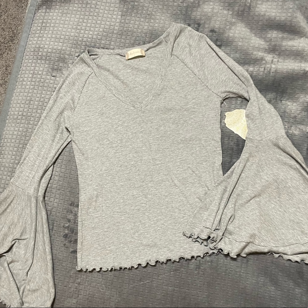 Gray shirt with bell sleeves